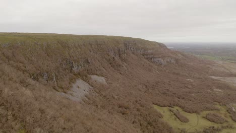 Aerial-tracking-over-Slieve-Carran-hilltop-reveals-peak-detail