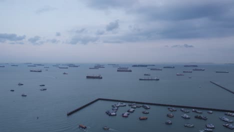 view of many logistic transport freight container ships in the sea