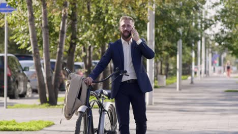 businessman arriving to his workplace on a bicycle