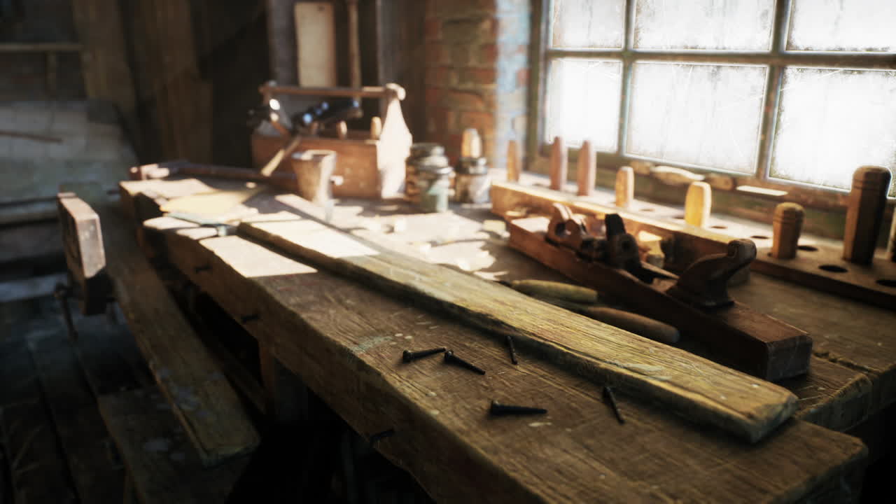 Old carpentry workshop filled with vintage tools and wood pieces from the past