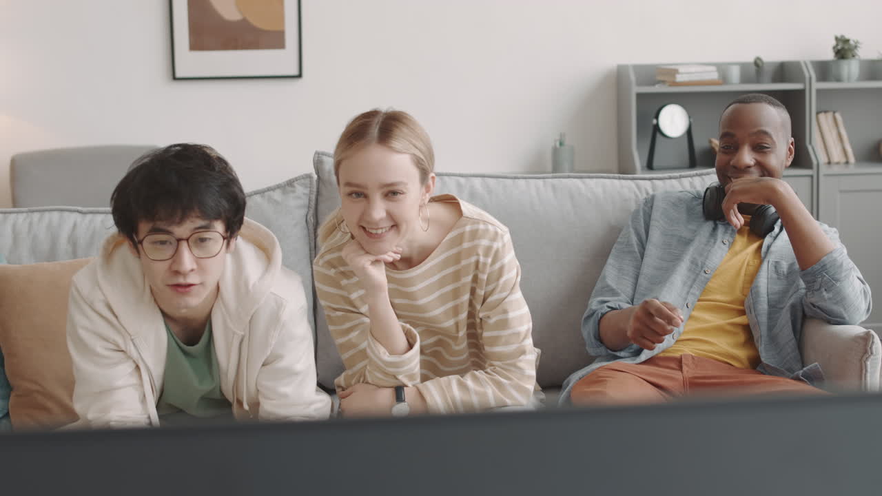 Young Friends Watching TV