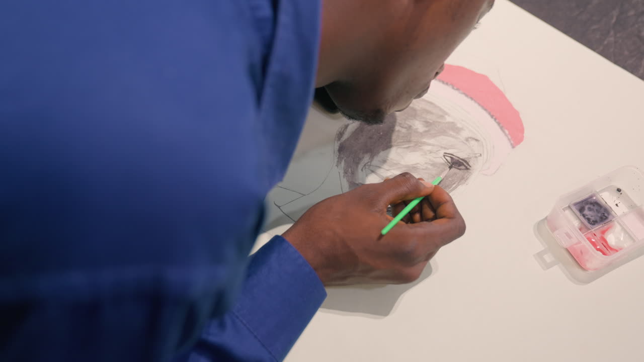 Black artist detailed portrait study with fine brush, closeup of hand stippling and shading, subtle grayscale textures and pink highlight, concentrated studio light, tiny meticulous strokes and steady