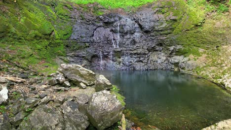 circular view from beautiful o quê pipi waterfall located at lush forest of príncipe natural park in prince island