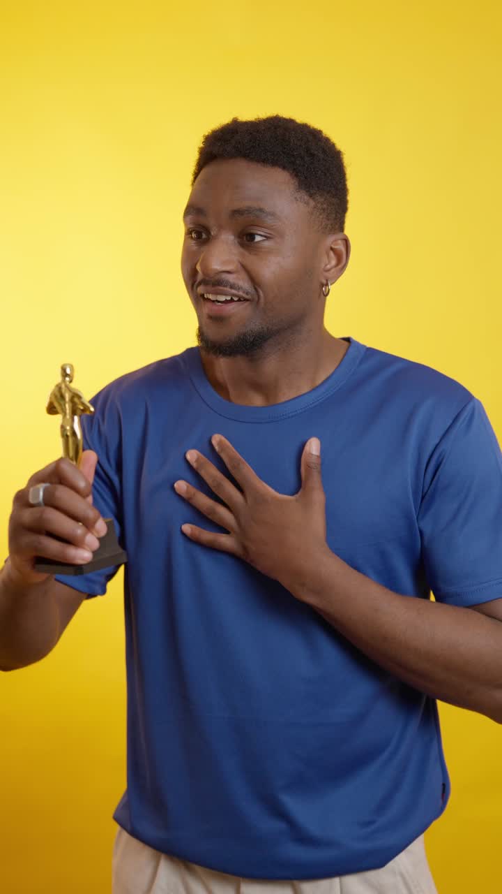 Man Holding Award