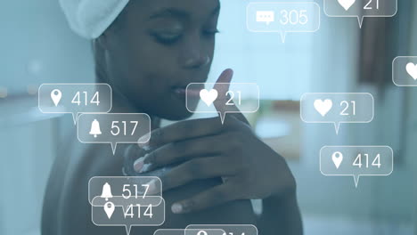 applying lotion, person surrounded by social media animation in bedroom