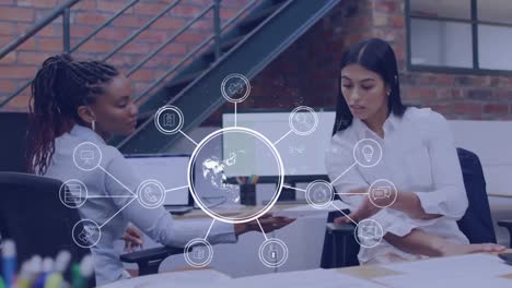 Animation of globe with icons over diverse business people in office