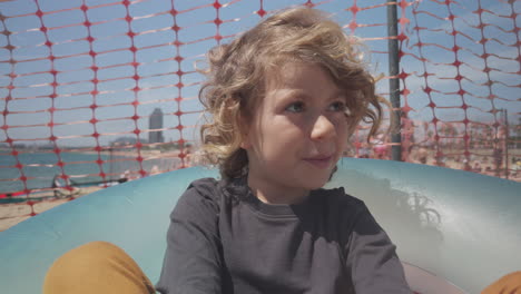 small girl relaxing on a beach in summer