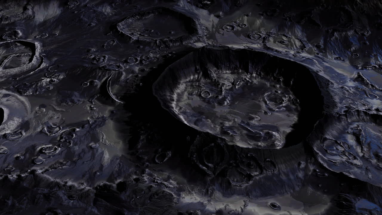 Details of lunar surface showcasing craters and rugged terrain during night