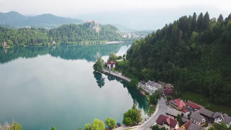 aerial view of slovenia's town of bled on the shoreline of bled lake