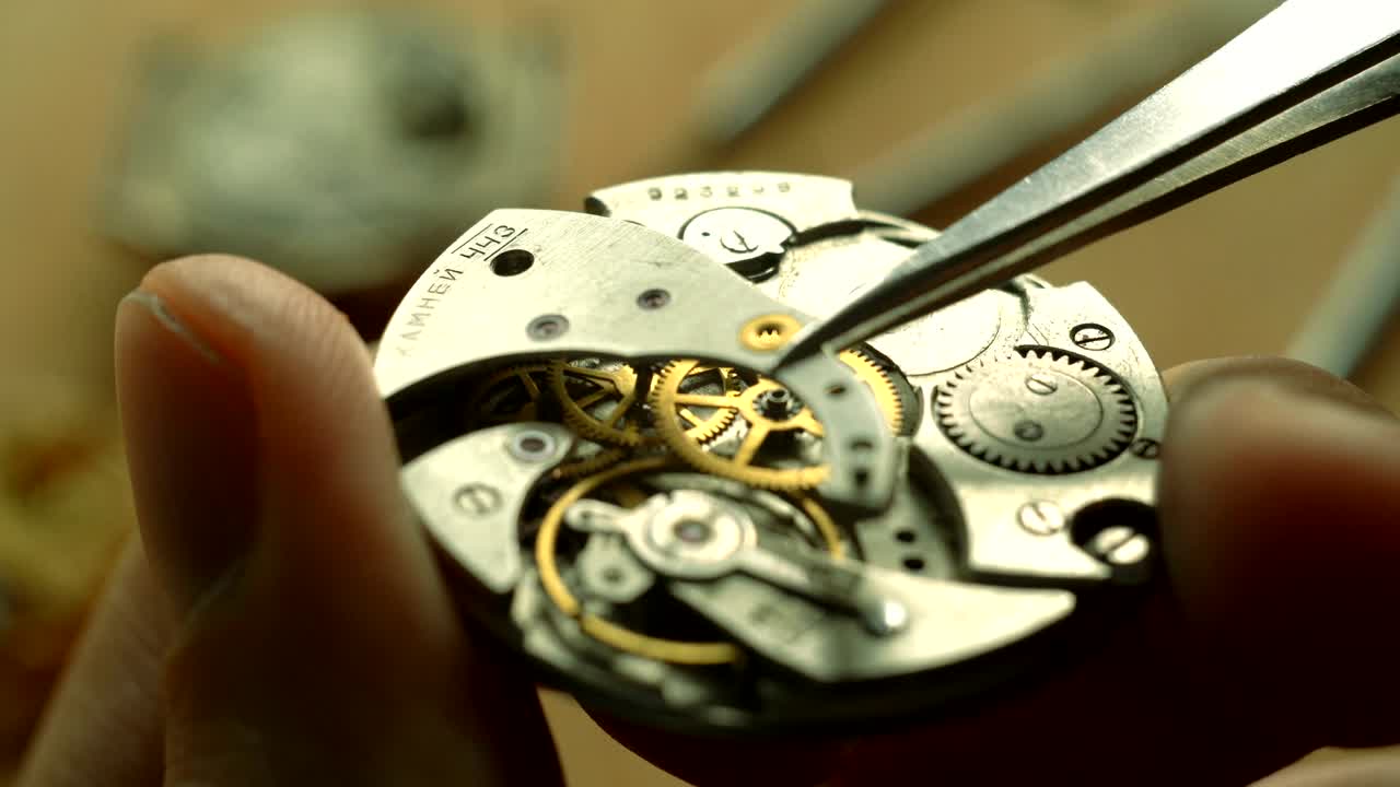 Mechanical watch repair process, close up | Premium Stock Video Footage