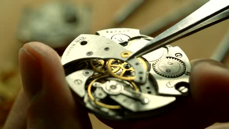 mechanical watch repair process, close up