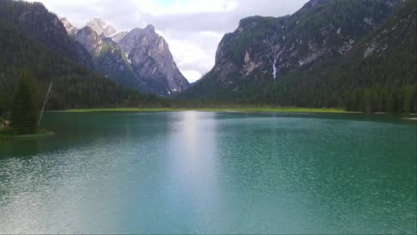 forward shot of lake dobbiaco, toblacher see