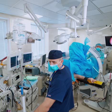 medical team operating in surgery room