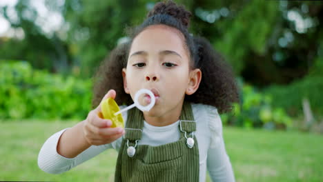 smile, girl and blowing bubbles outdoor