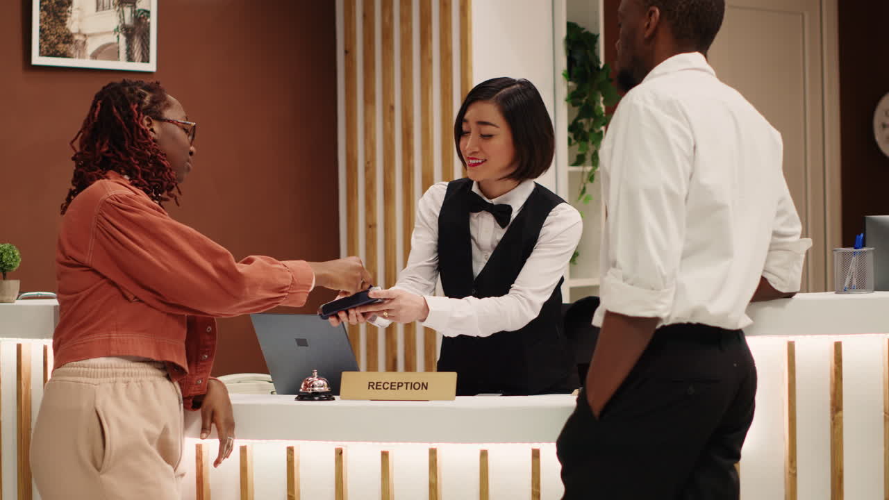 Tourists purchasing luxury hotel room