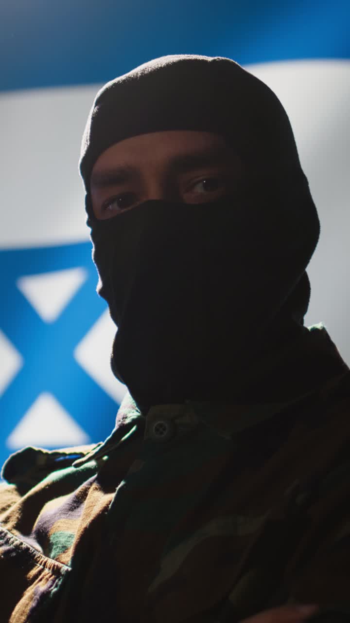 Vertical video Israeli secret agent in war control room crossing arms, representing country