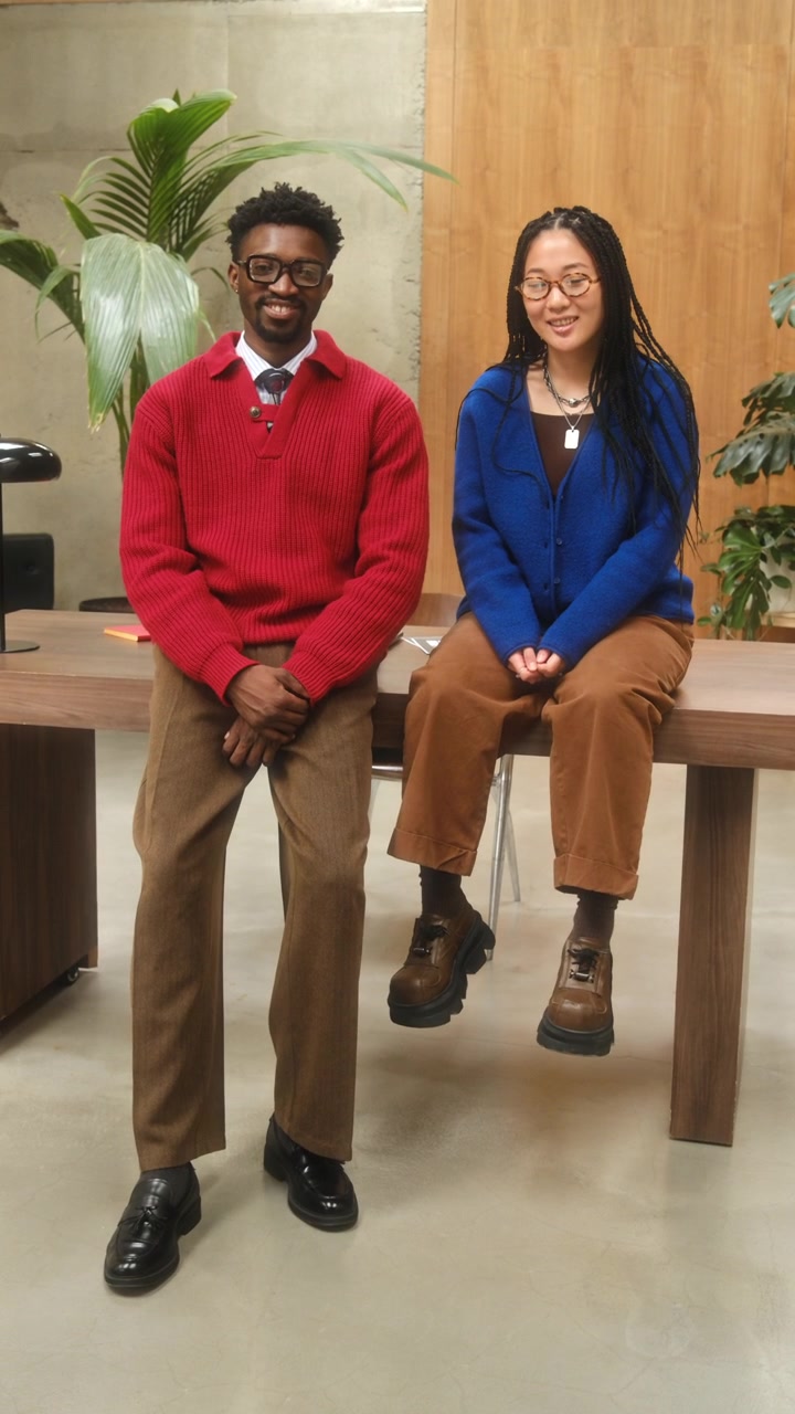Portrait of Young Diverse Colleagues Smiling at Camera in Stylish Office