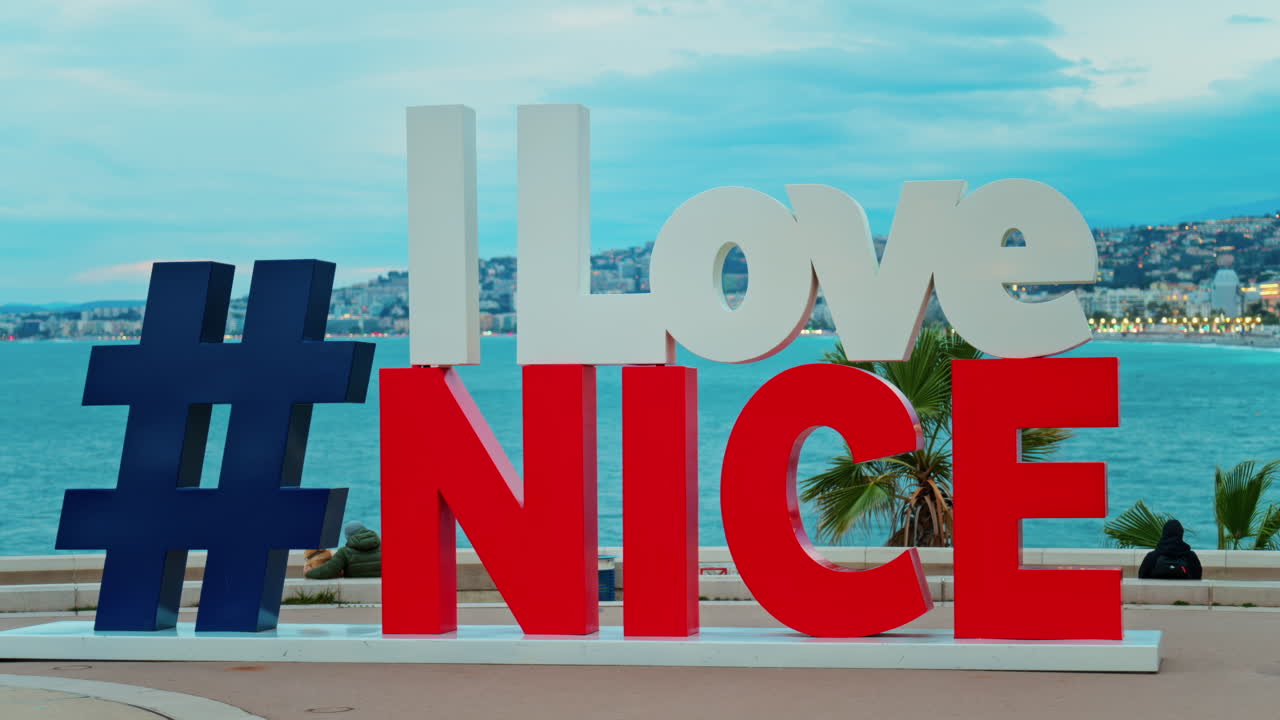 View of the I Love Nice sign on the promenade overlooking the sea in Nice, France