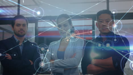 Animation of network of connections over portrait of diverse colleagues with arms crossed at office
