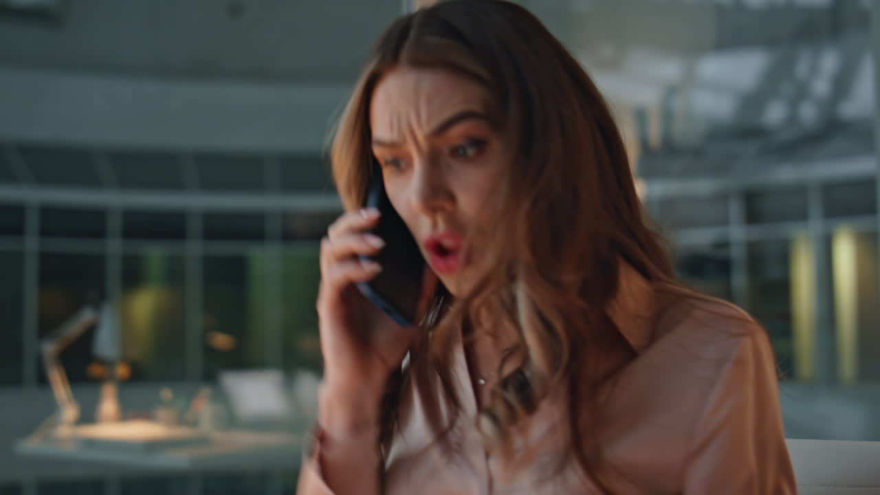 Anxious businesswoman discussing problem on call closeup. Angry woman talking