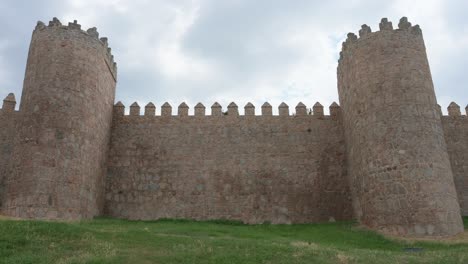 the medieval walls of ávila, spain, are remarkably well-preserved, encircling the town. recognized as one of europe's finest examples of medieval fortification and part of unesco world heritage site.