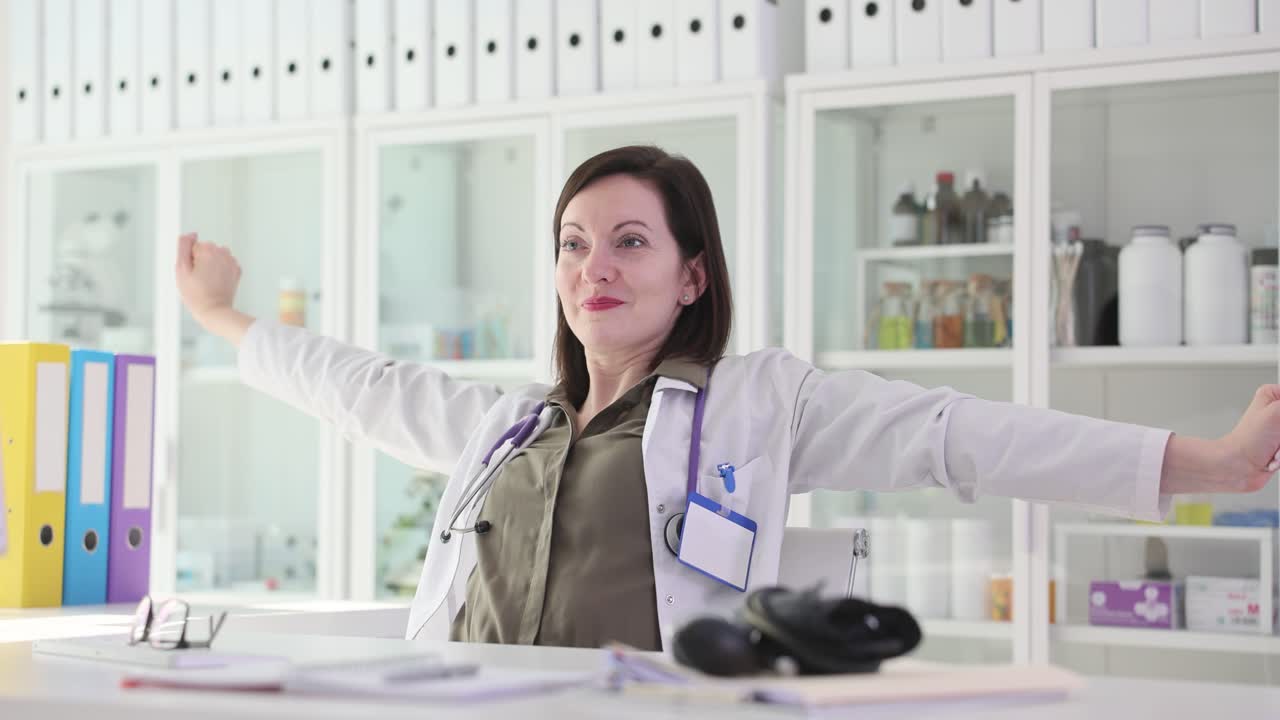 Doctor Stretching in Office