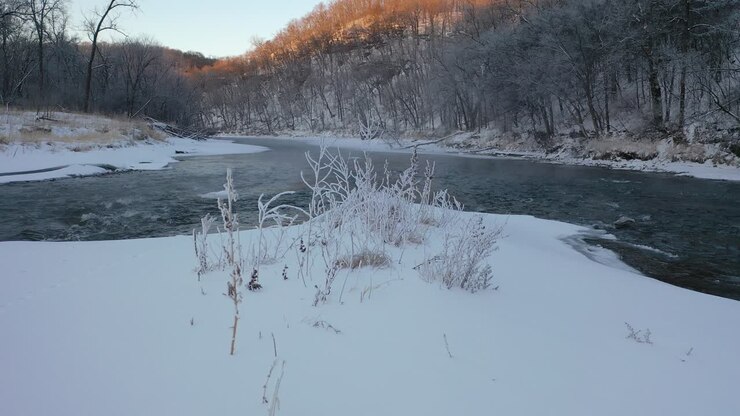 Winter Sunrise Over a Frozen River