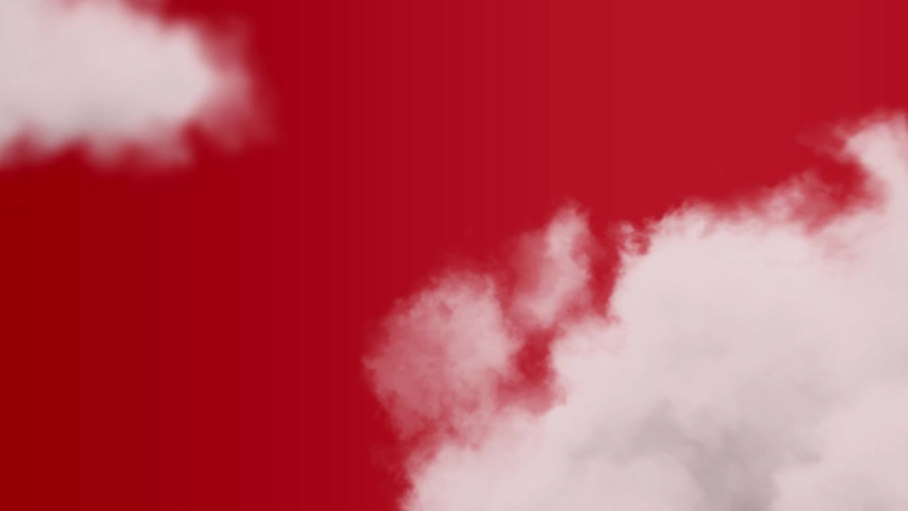 White Clouds Moving Across a Vibrant Red Background