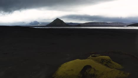 dramatic sky over mount maelifell in southern iceland