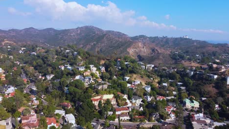 drone shot panning left to reveal the hollywood sign