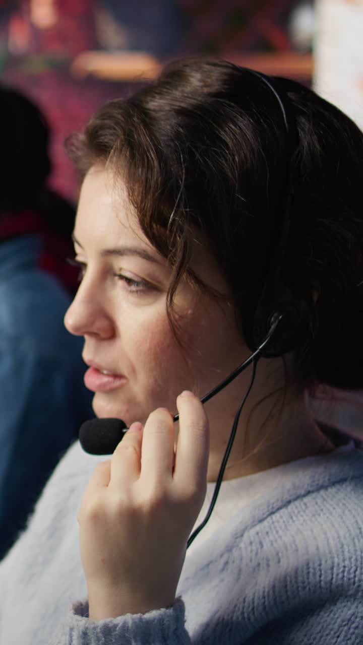 Vertical video Call center employee handling customer inquiries and complaints