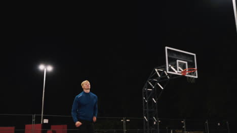 focused blond man running in the park at night 4