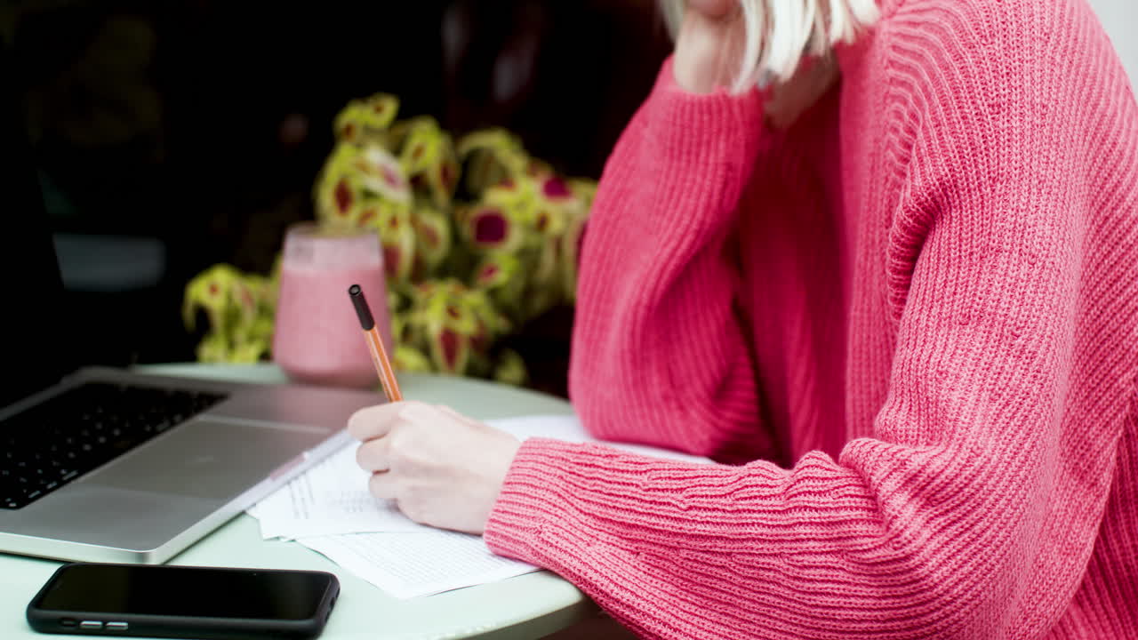 Thoughful woman on a terrace