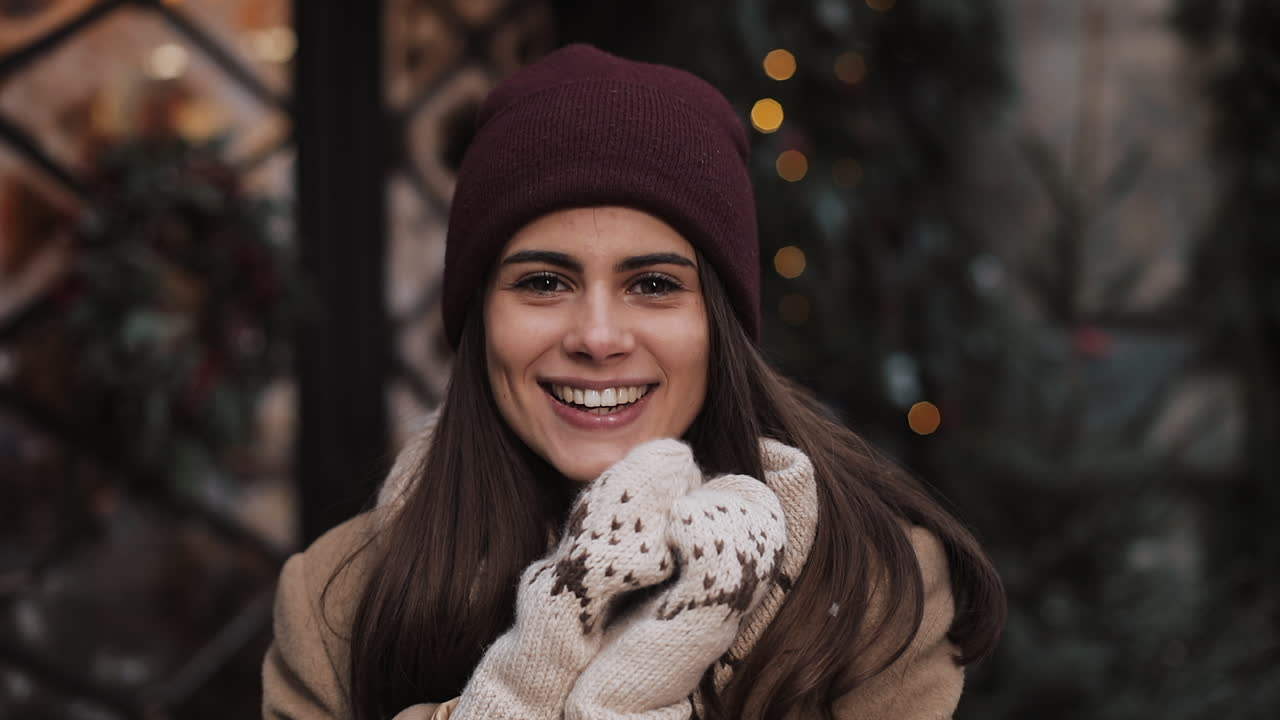 A woman smiles during winter
