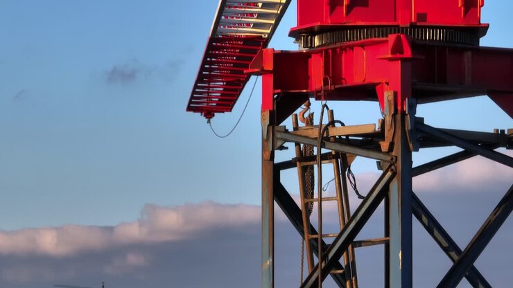 Ladder inside the structure of a crane, close up aerial view