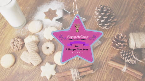 animation of happy holidays text over christmas decorations