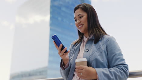 Woman,-takeaway-coffee-or-phone-in-city-on-social