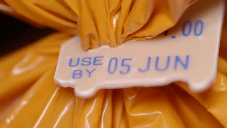 close-up of a 'use by' date on a food package