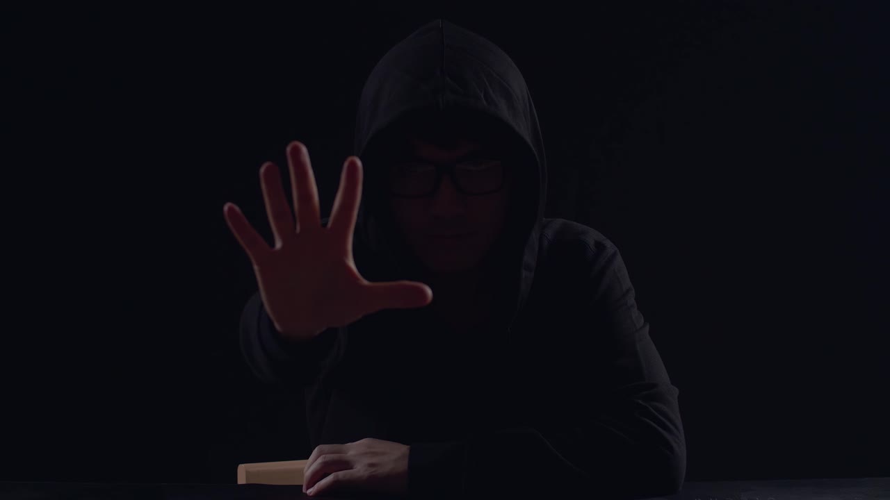 Hacker Showing Stop Hand