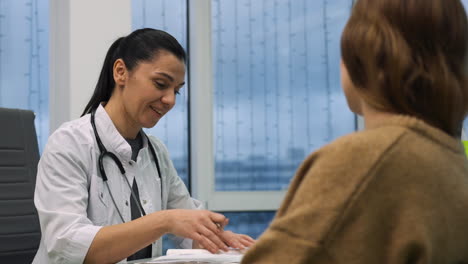 doctor talking with patient