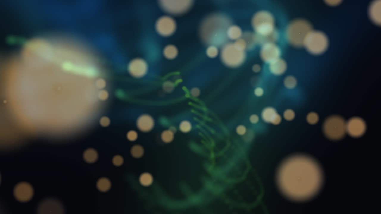 Animation of spots of light moving on green mesh background