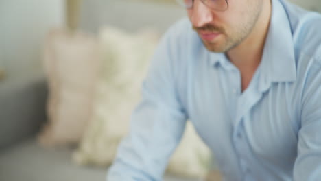 Businessman-Writes-Emails-on-Laptop,-Close-Shot