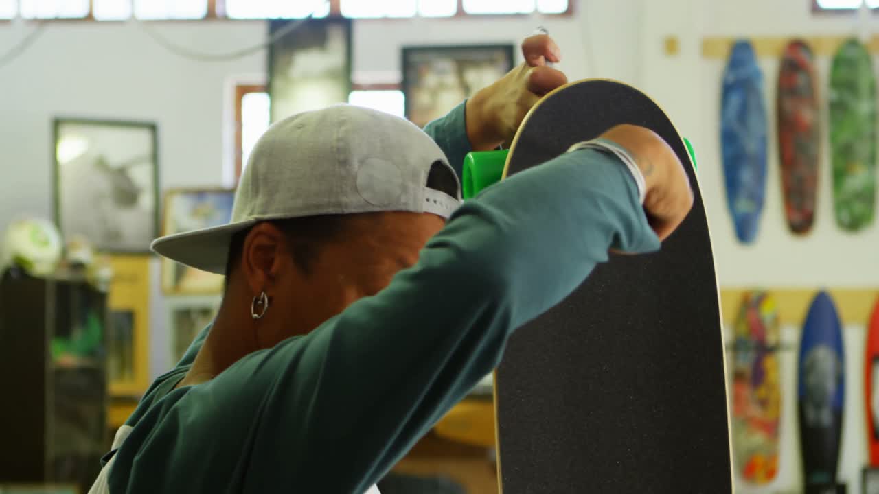 Man making skateboard 4k