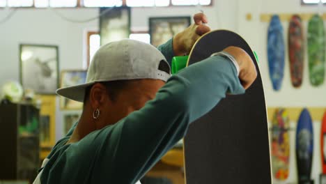 man making skateboard 4k