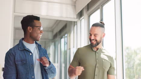 Business,-men-and-fist-bump-for-achievement