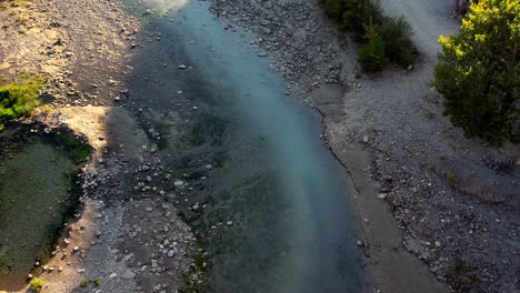 bridge at the langarica canyon in albania, with thermal sources hot water