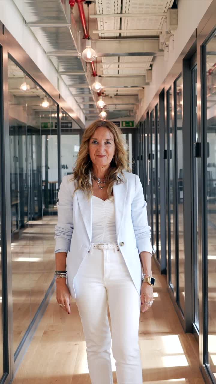 Professional Woman in Office Hallway