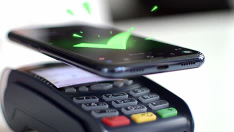 seamless mobile payment technology: engaging with innovative contactless payment methods featuring a smartphone and point of sale terminal in action