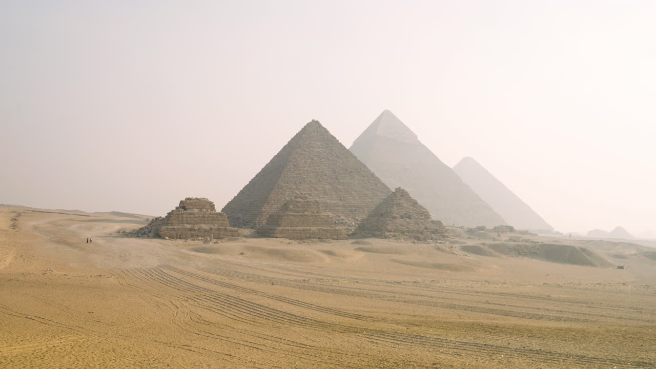 An Early Morning View of the Pyramids in Giza, Egypt - Pan Right Shot