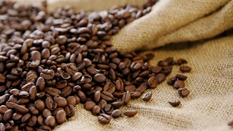 roasted coffee beans on sack textile